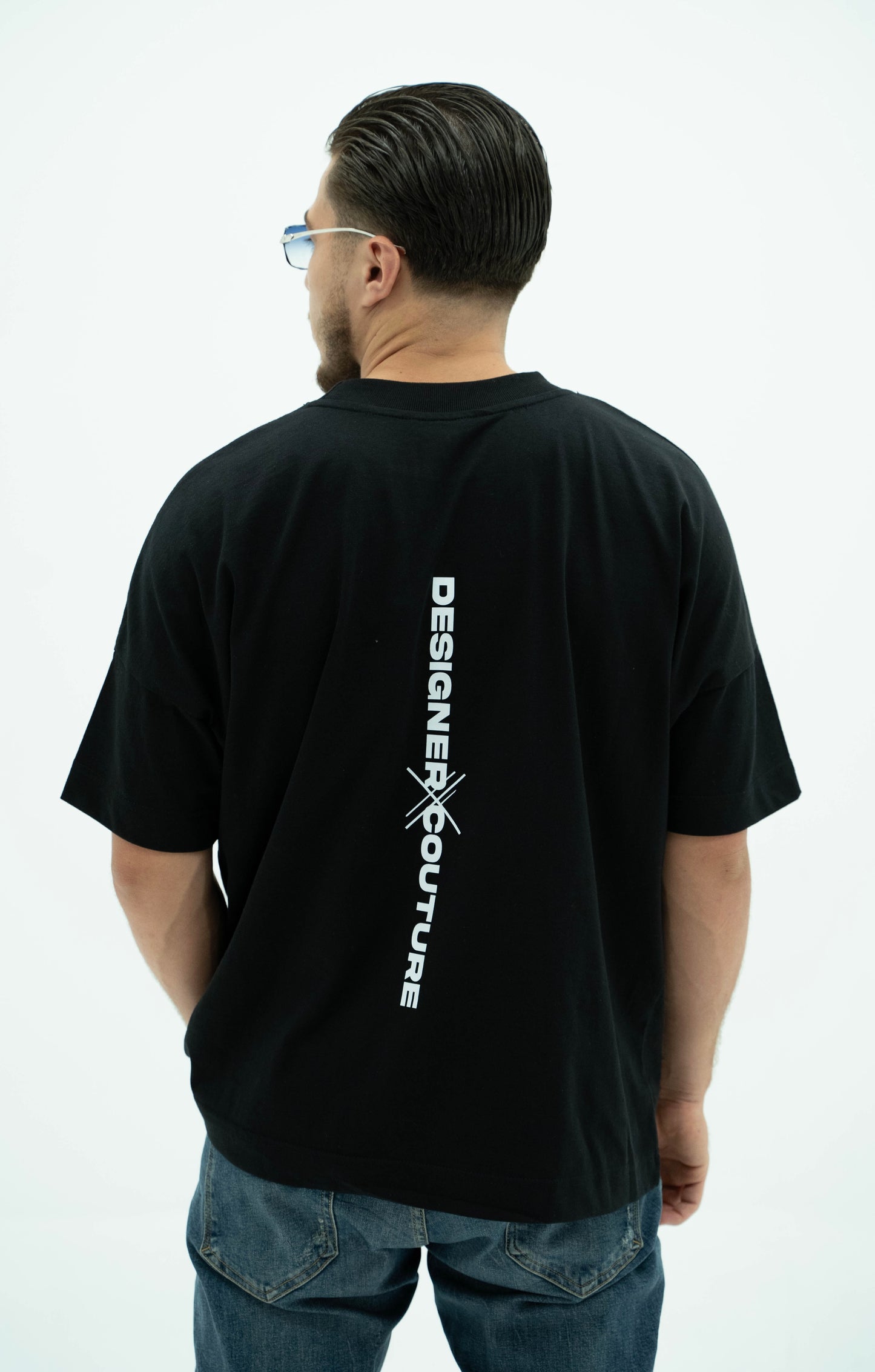 Oversized Black t-shirt with long DC details in the back