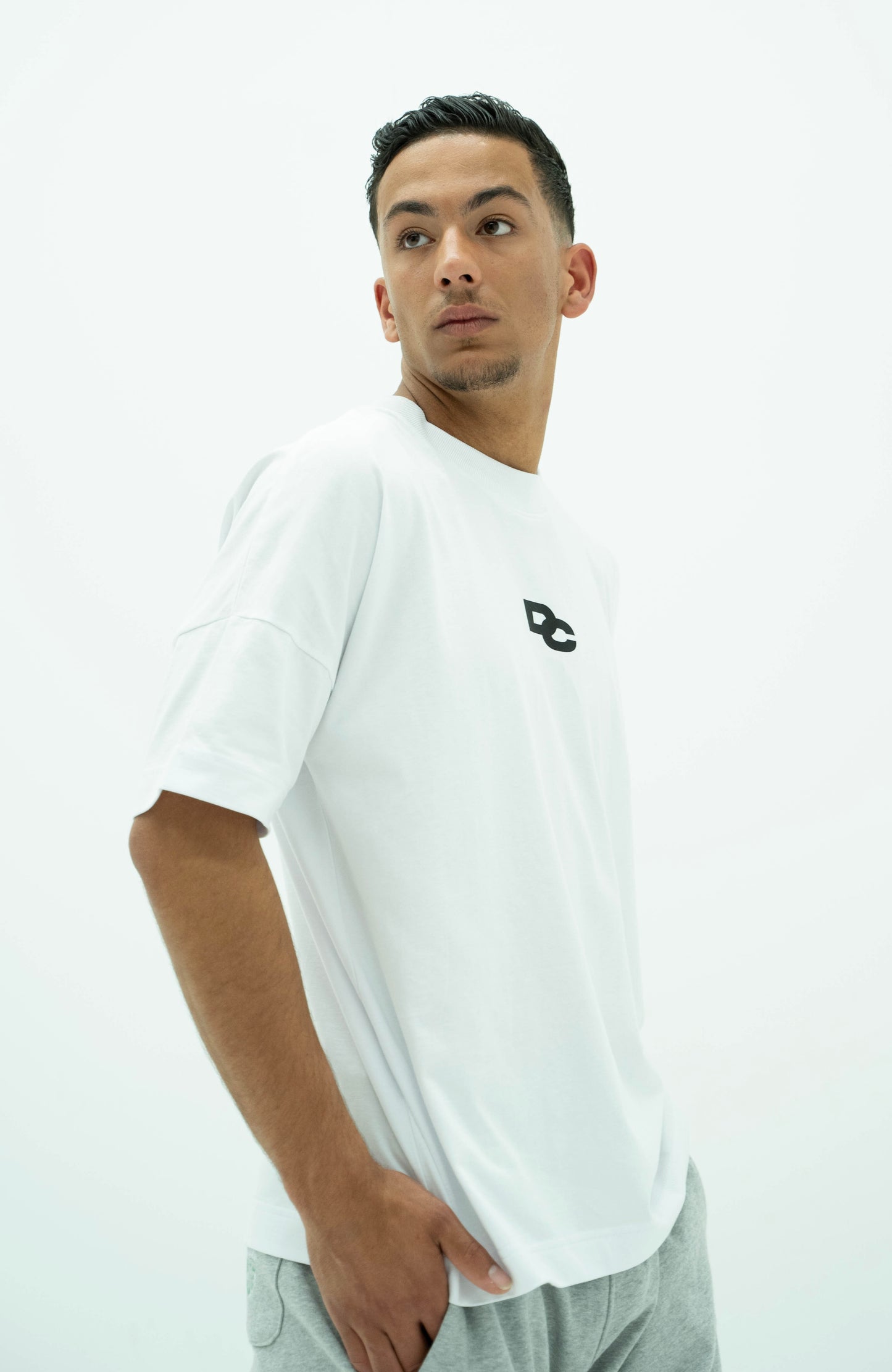Oversized White T-shirt with Long DC detail in the back