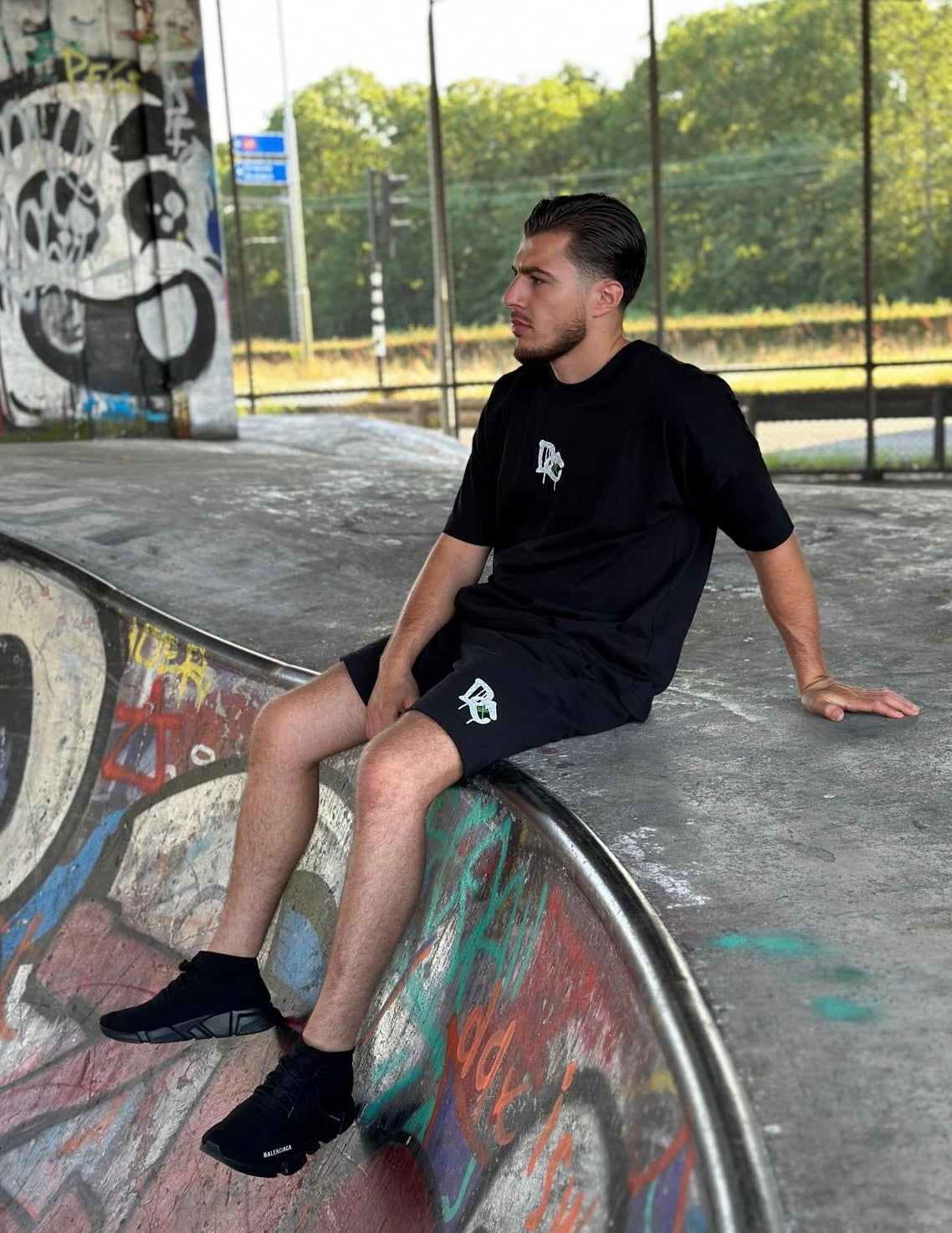 Oversized Black T-shirt with green DC details